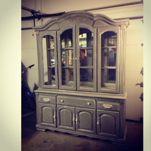 This old brown china cabinet was painted with Annie Sloan French Linen with Old White distressed accents. 